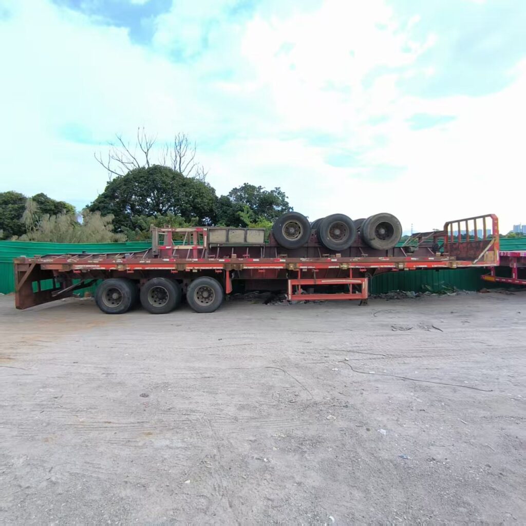 Steel Flatbed Semi Trailer Three Axle Sixty Ton Cargo Transport Trailer Platform Truck Semi Trailer