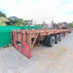 Steel Flatbed Semi Trailer Three Axle Sixty Ton Cargo Transport Trailer Platform Truck Semi Trailer