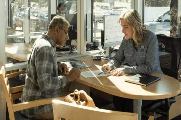 Professional buyers calculate the complete investment before making a decision Buyer calculating total ownership costs including purchase price, maintenance, repairs, and transportation expenses for a Canadian commercial truck