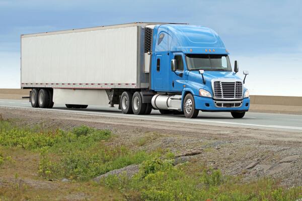 Transportation fleet using truck tractors with different dry van, refrigerated, flatbed, and specialized trailers